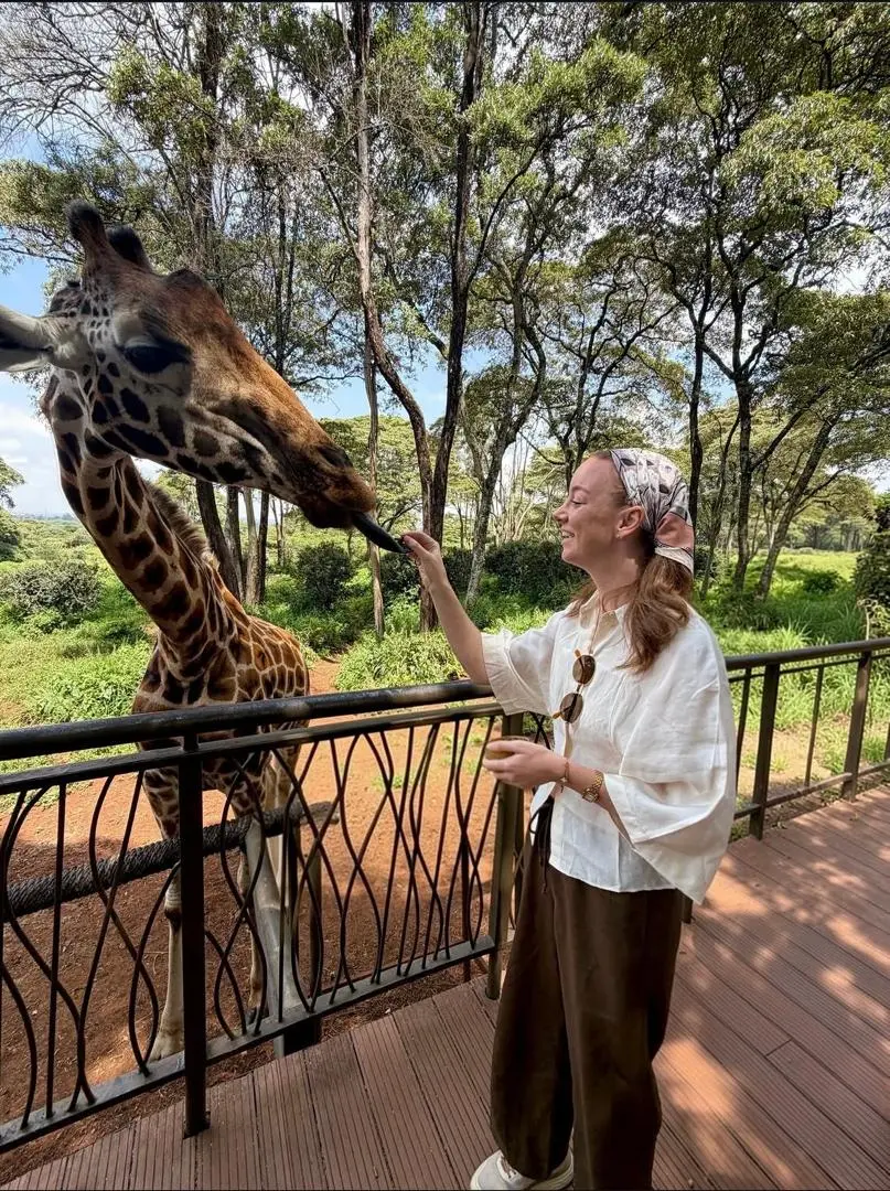 Feeding a giraffe at the sanctuary
