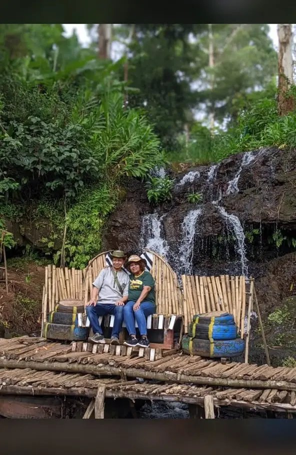 Couple at a waterfall